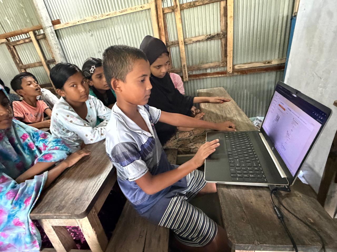 Students are using the Teach Os app.
